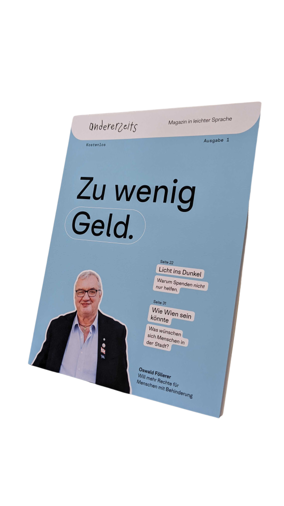 Mockup eines Printmagazins in leichter sprache. Blaues Heft auf mit dem Titel Zu wenig Geld