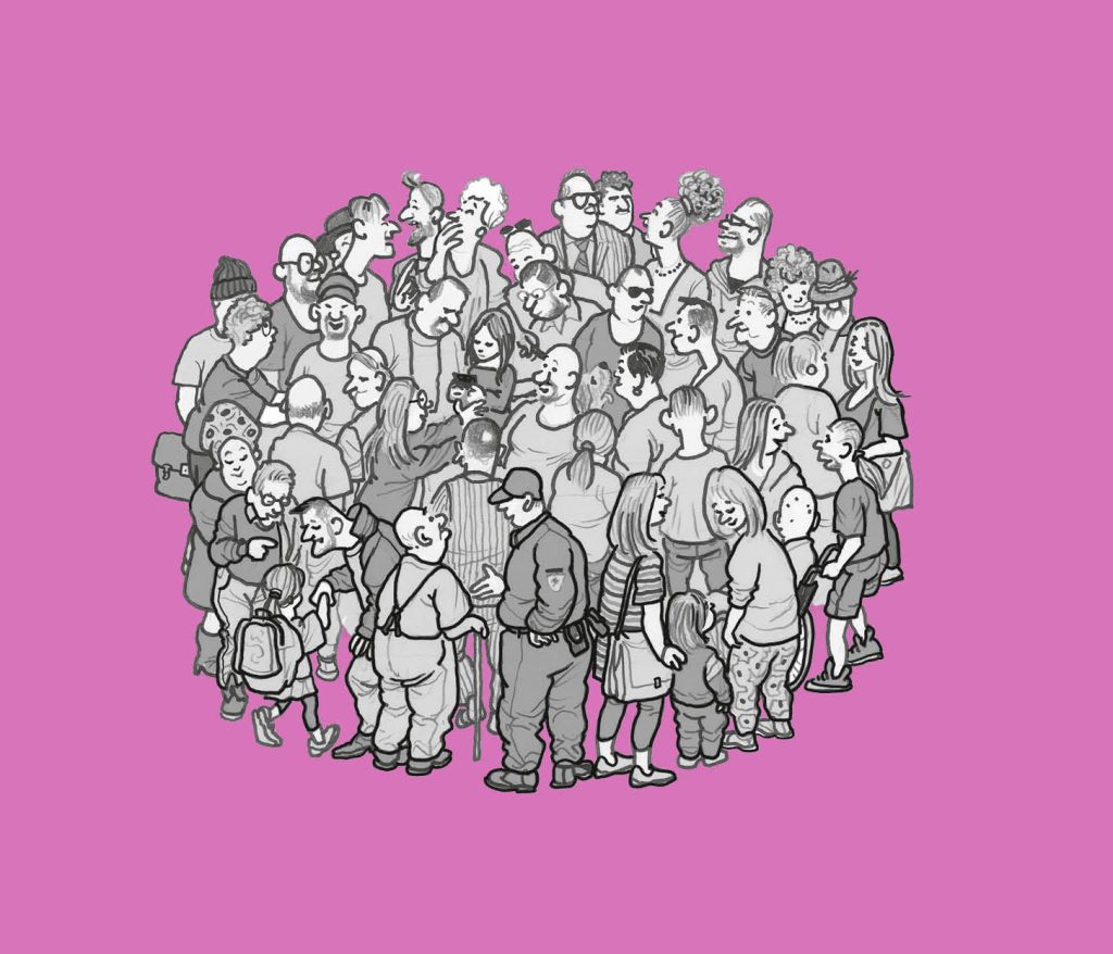 Viele Menschen stehen als Gruppe in einem Kreis zusammen.