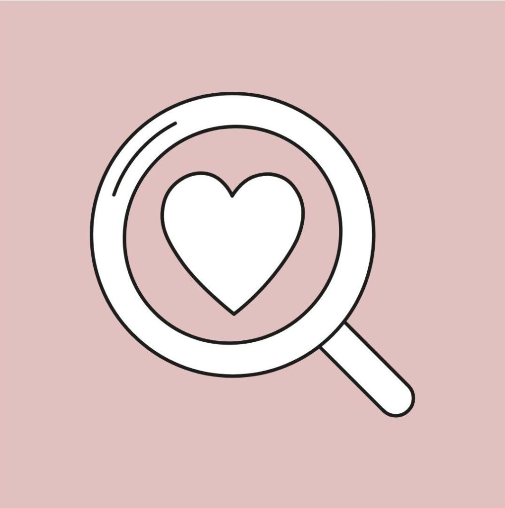Die Illustration zeigt eine Lupe. In der Mitte der Lupe ist ein Herz. Die Lupe und das Herz sind weiß mit schwarzen Rand. Der Hintergrund ist rosa.